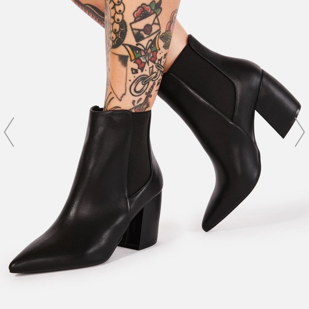 Black pointed toe booties